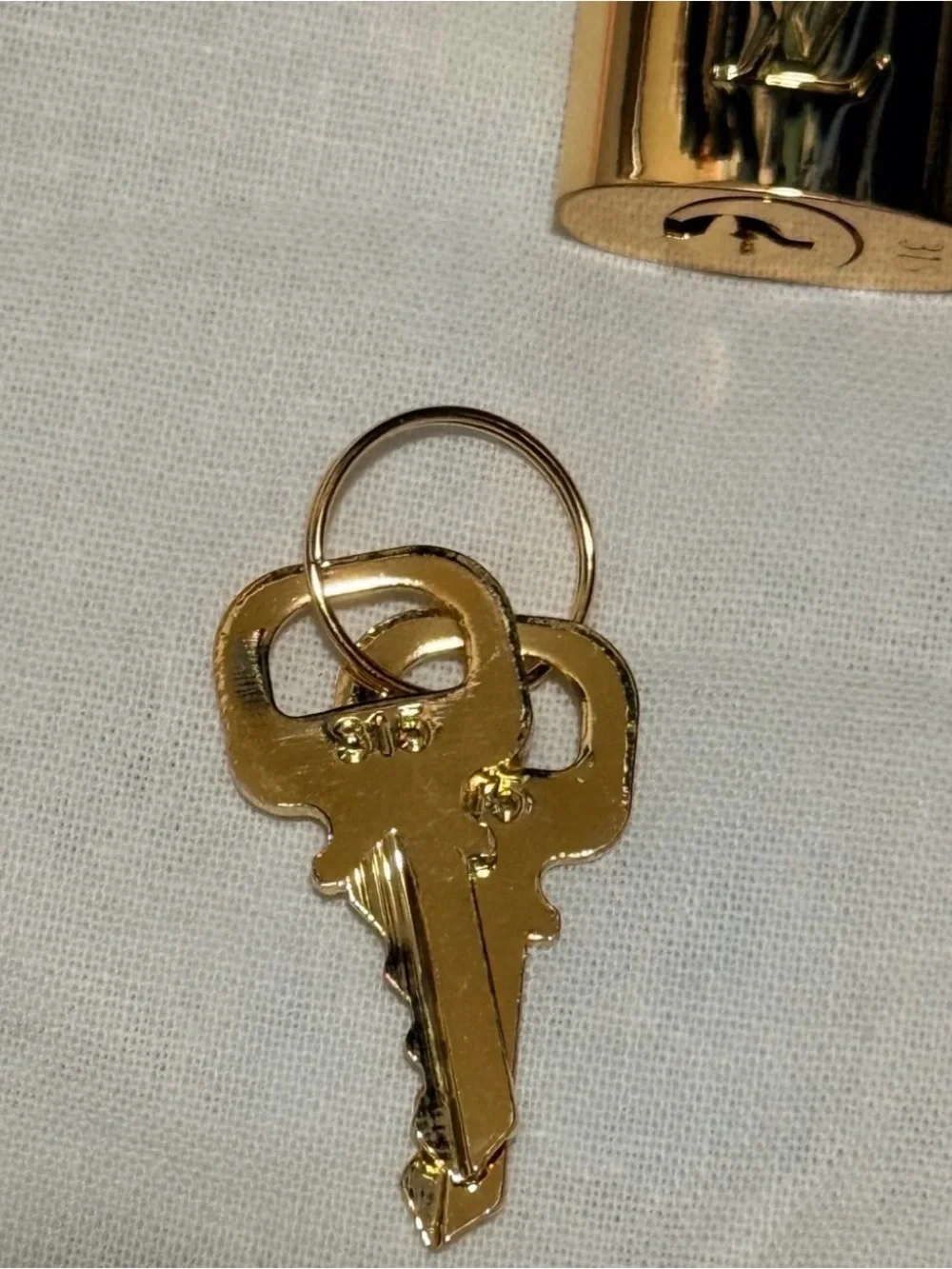 Louis Vuitton Gold Padlock with Matching Keys